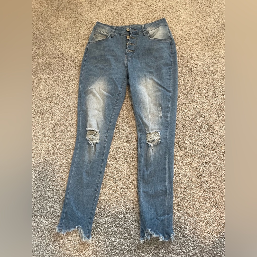 Distressed ankle cut jeans